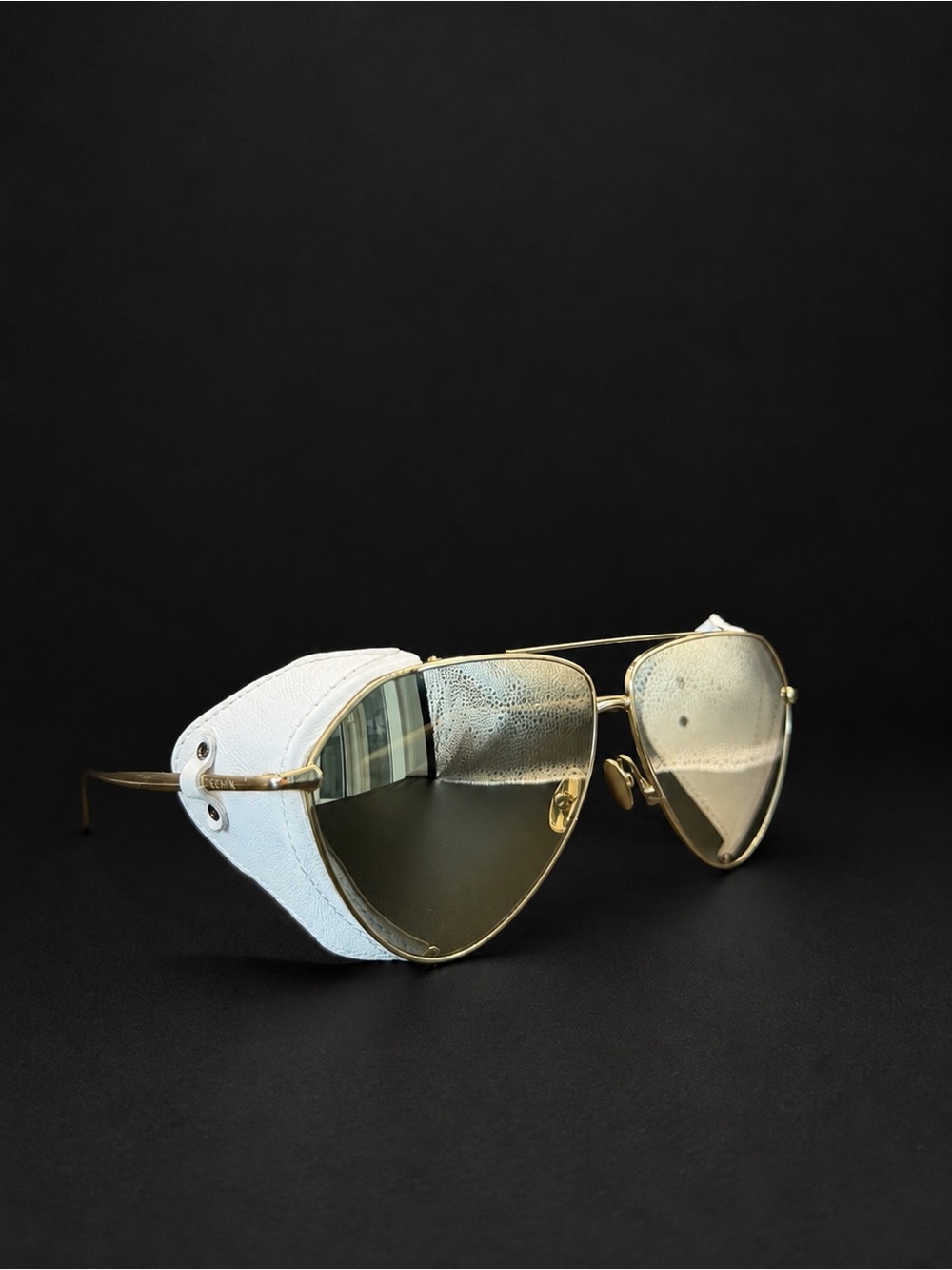 Alaïa Gold Frame Sunglasses with White Side Shields